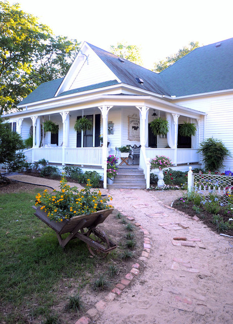 Фотография экстерьера дома с выходом в сад